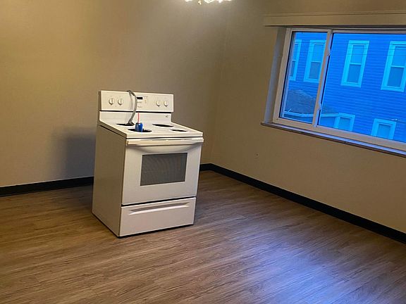 Living Room( Stove was being replaced , so it is gone)