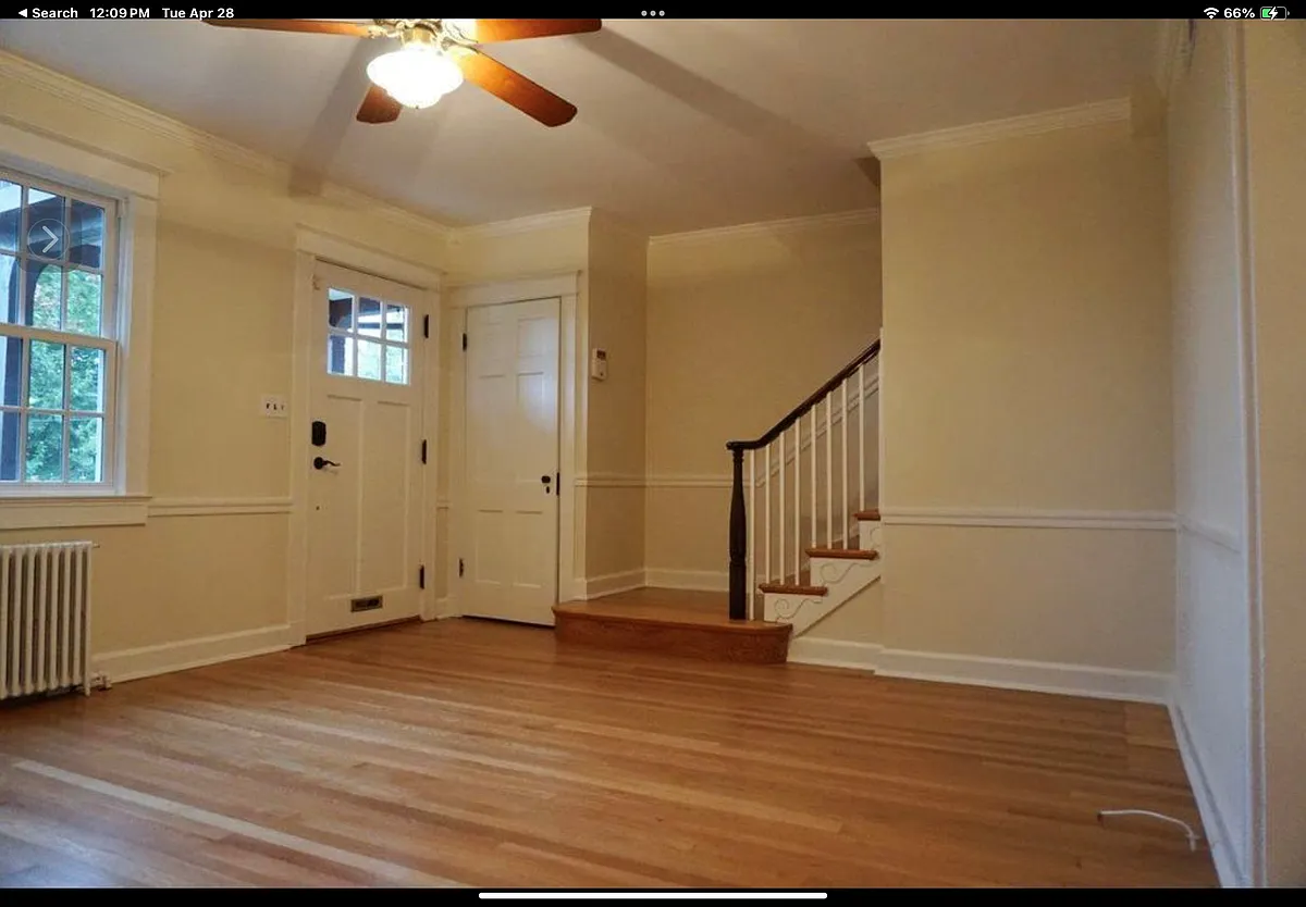 Living Room, Front Door, coat closet, staircase to second floor - 1537 Foxhall Rd NW