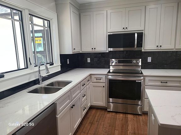 This kitchen is coming together so nicely. All new appliances, beautiful black tile pulls this space together with the black hardware. Clean and elegant.