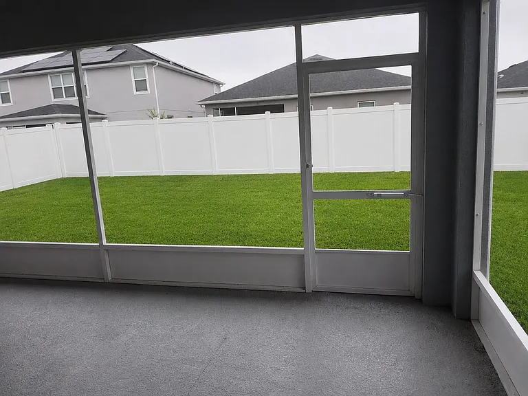 Back yard and screened patio