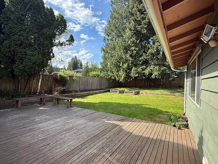 Large deck and spacious back yard.