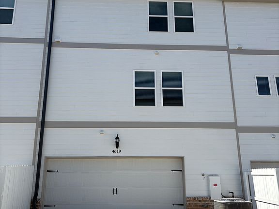 Spacious two car garage w/ storage space