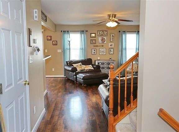 Entry foyer view...garage access to the left and powder room is located on the right.