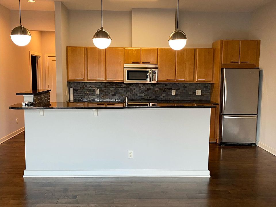 Spacious living area is open to large kitchen.
