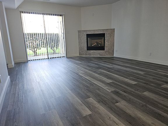 Living room with gas fireplace.