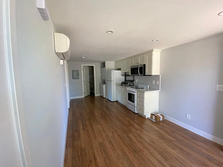 View of living room and kitchen