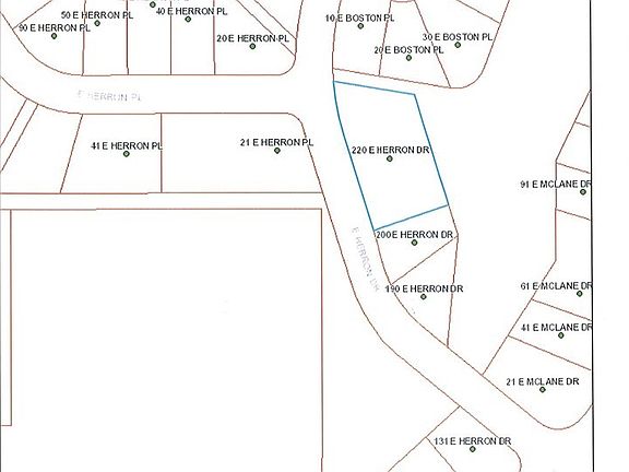 Three lots combined into one with County Boundary Line Adjustment creates a large, secluded homesite.