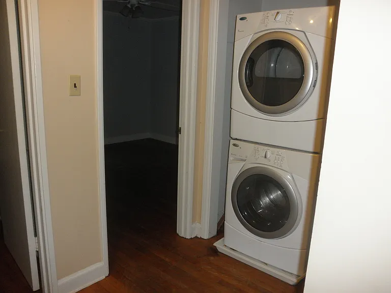 Washer & Dryer in back hall, outside of bedrooms.