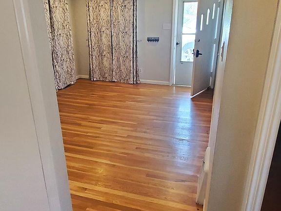 Looking into living / family room on main floor from kitchen.