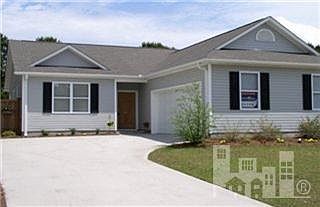 1st image of 220 SE Sand Pebble Drive
