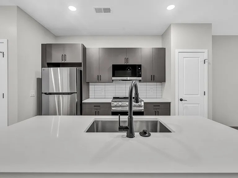 Chef-inspired kitchen with stainless steel appliances