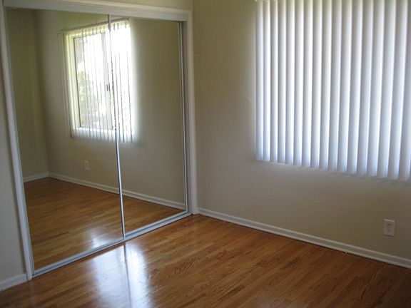 Bedroom with ample closet and storage space