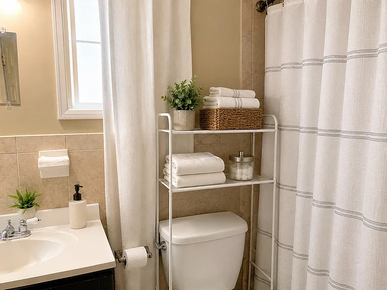 bathroom with vent and window for extra ventilation.
