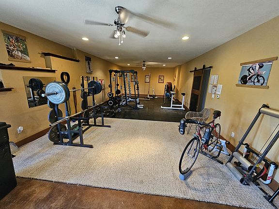 Large, open, airy, well-equipped gym and gear storage
