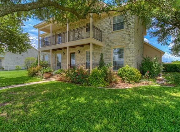 Beautiful 4 BR 2.5 Bath Fredericksburg style farmhouse with tin roof and beamed ceilings. Totally remodeled on 1.25 acres near town and close to toll road. Wood floors, granite, stainless appliances all baths remodeled and gorgeous!  Master craftsman buil