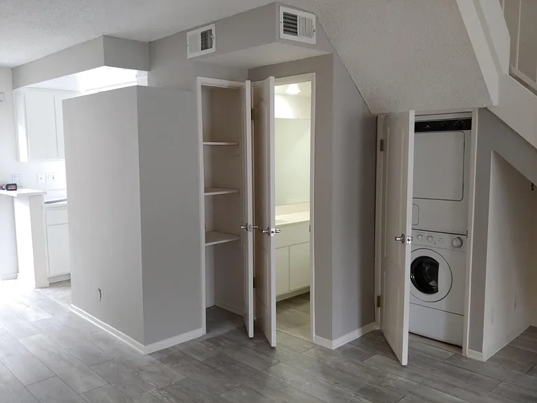 Pantry, guest bathroom and in unit washer/dryer