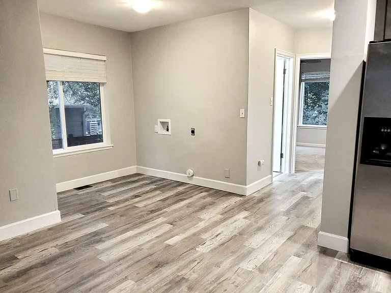 Dining area and/or secondary laundry hookups for main level laundry if desired.
