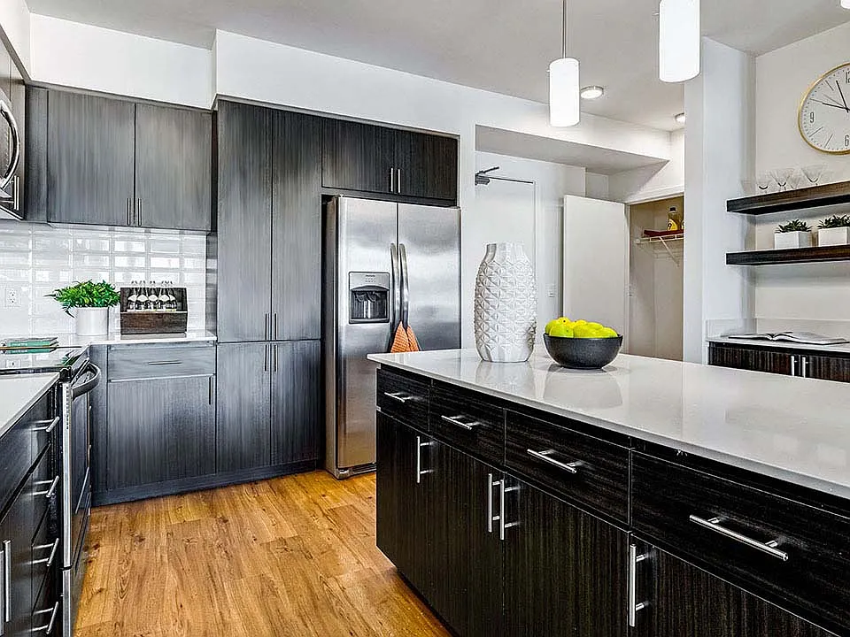 Griffis Shoreline apartment kitchen with quartz countertops.