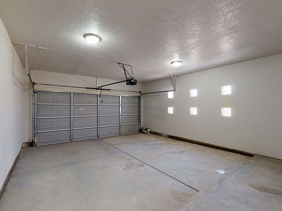 finished two car garage with automatic and WiFi openers and 9' ceilings