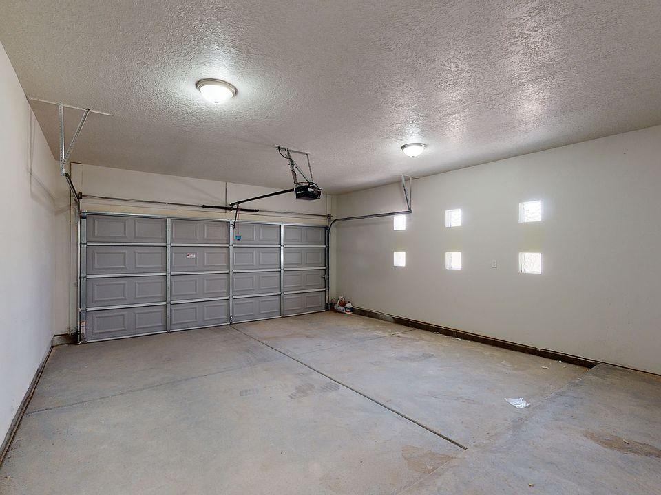 finished two car garage with automatic and WiFi openers and 9' ceilings