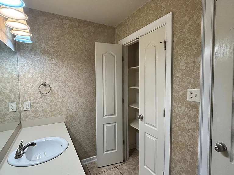 Master Bathroom Storage Closet