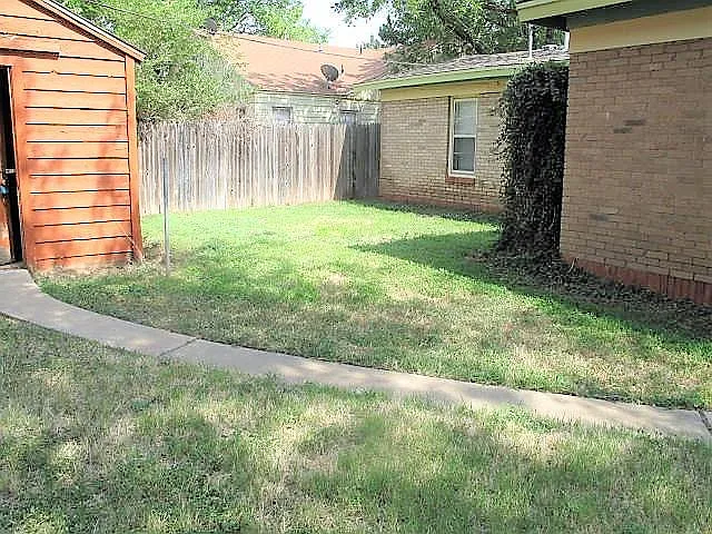 Storage shed in backyard