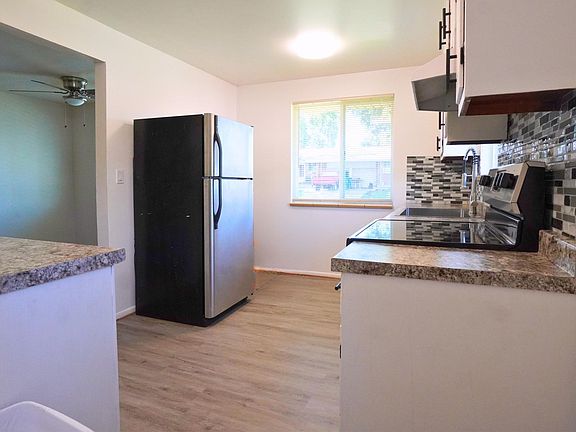 New Countertops, new Sink, New Floor, Stainless steel stove, refrigerator, and dishwasher.
