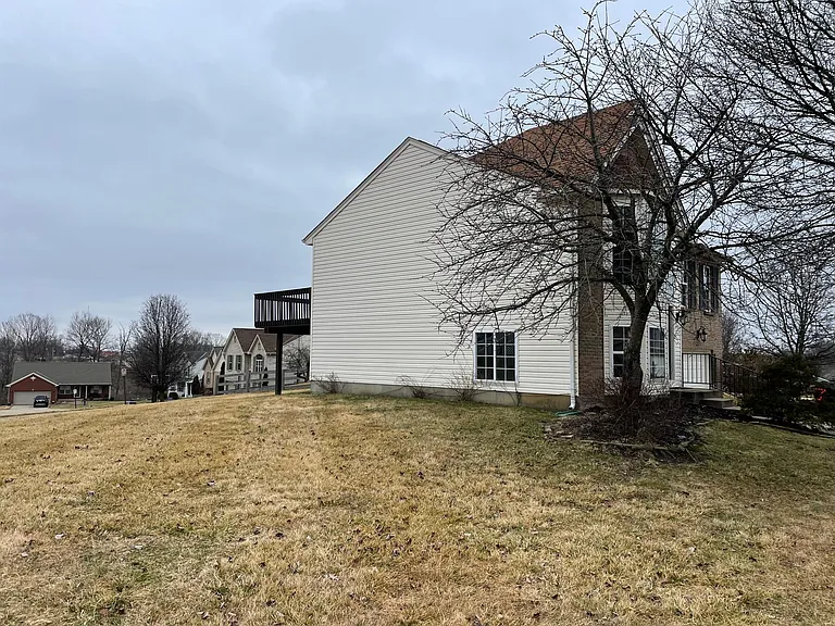 Side view of this adorable house and large, corner lot.