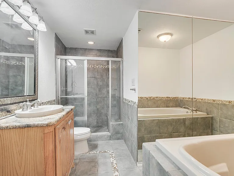 Master Bath includes standing shower plus Jacuzzi Tub