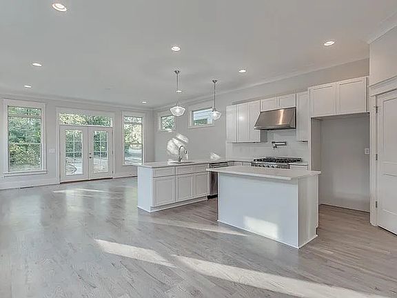 open kitchen and living room... this photo is before the refrigerator was added.. but there is a refrigerator there now.