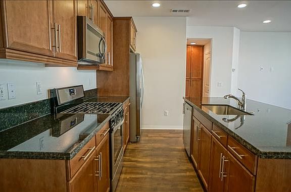 Maple cabinets and granite kitchen counters