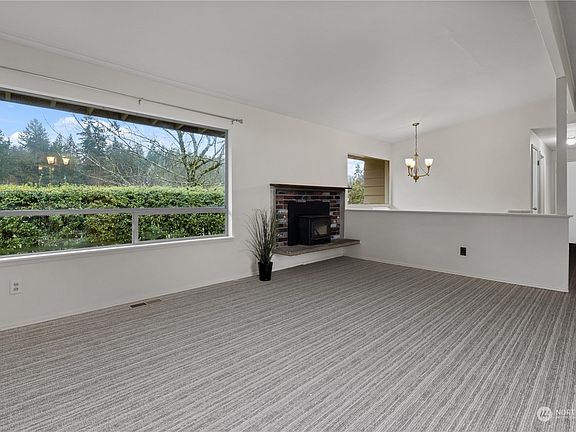 Then, enjoy spring and summer basking in a shower of natural light in the great room>