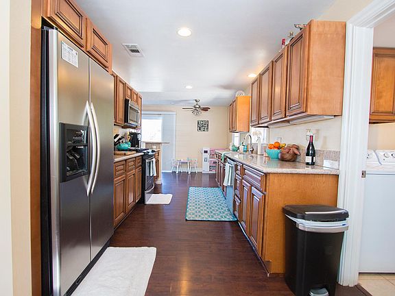 Kitchen, laundry room, 1/2 bath area