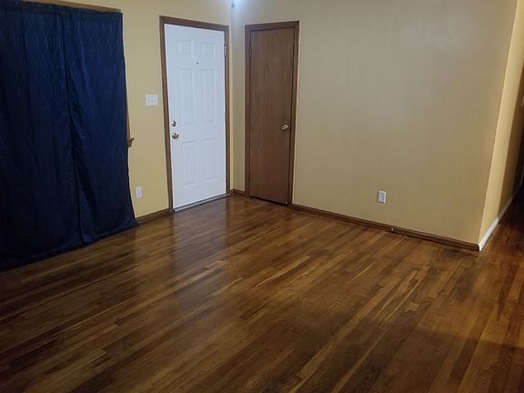 Front door and Foyer closet from Living room.