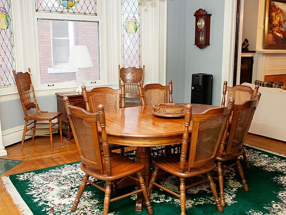 Dining room with beautiful stained glass windows.