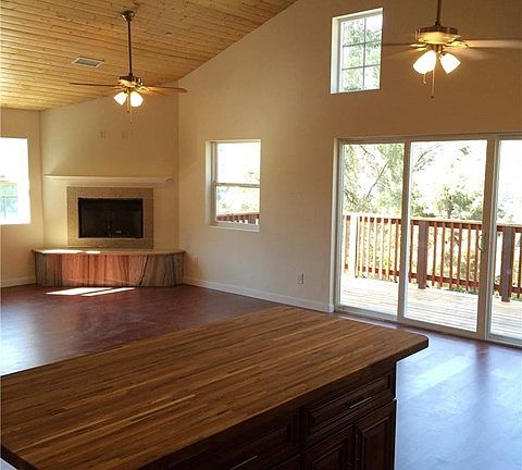 View into open concept living room from kitchen