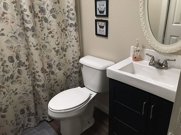 One of the 2 full bathrooms