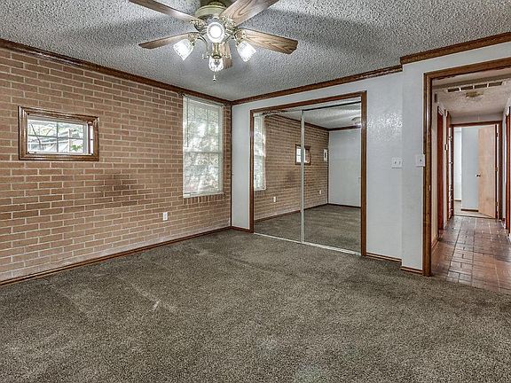 Master with brickway and large closets. Plenty of room for a large bed.