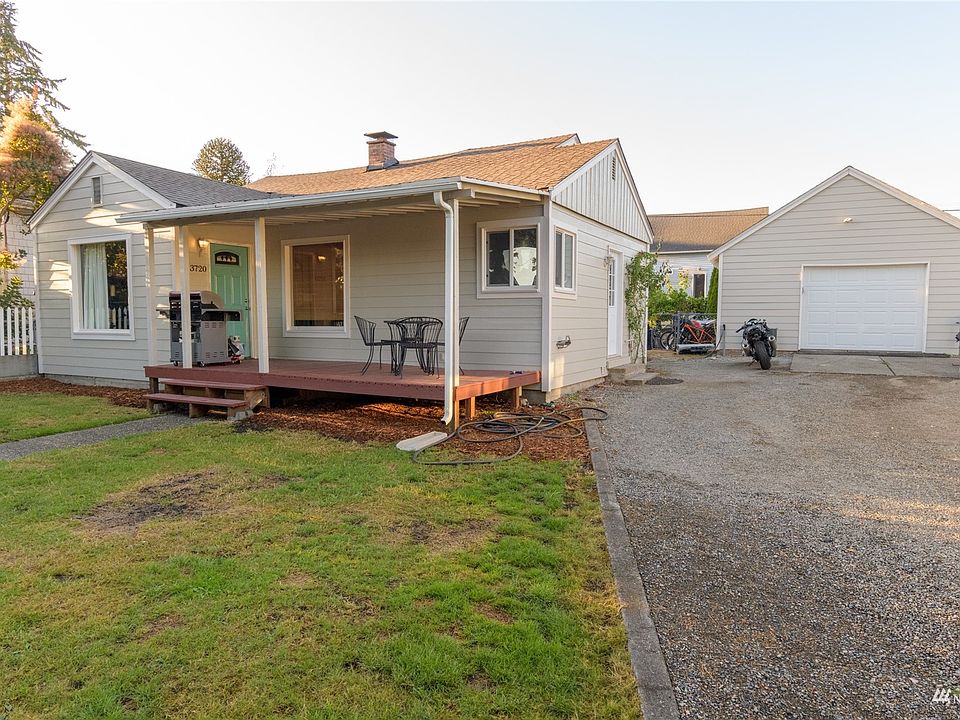 Super cute covered front porch greets you as well as fruit trees and fully fenced yard with back patio and lots of off street parking. This nicely remodeled home includes a large 21' x 27' detached garage/workshop both with hardy plank siding. The homes roof was installed 2013 and the garage roof this year. The Kitchen boasts new cabinets, granite counter tops, subway tile, vinyl plank flooring, SS appliances &ceiling fan. You'll love the arched doorways, plastered walls, original hardwood floors and shiplap walls. Enjoy 2 bedrooms on the main floor and large, newly remodeled full bath with separate shower & laundry shoot! The well lit lower level has 1 bedroom, storage area & laundry. Just minutes to PSNS, bus stop, Seattle Ferry & Hwy 3.>