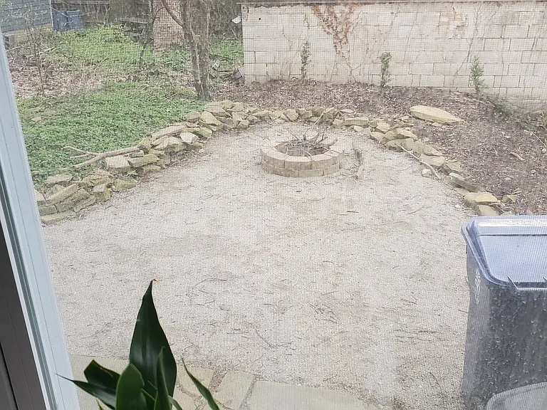 view of firepit in back yard