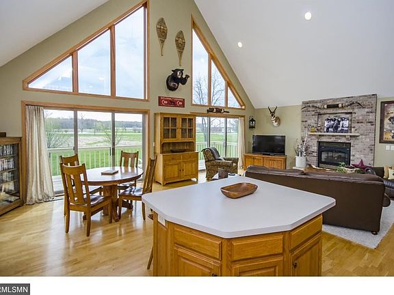 OPEN FLOOR PLAN WITH SOUTHERN EXPOSURE AND VAULTED CEILINGS