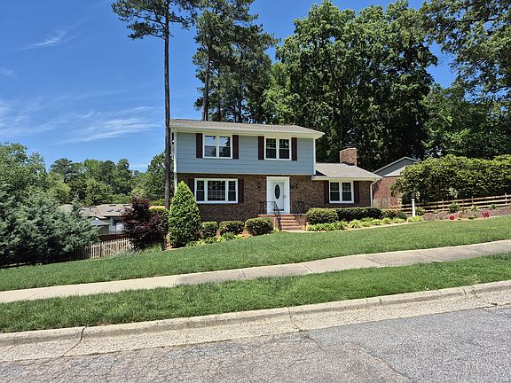 New updated pic with a spacious front gorgeous lawn and great curb appeal. Neighbors have stated that this is the most beautiful home in all of the neighborhood!