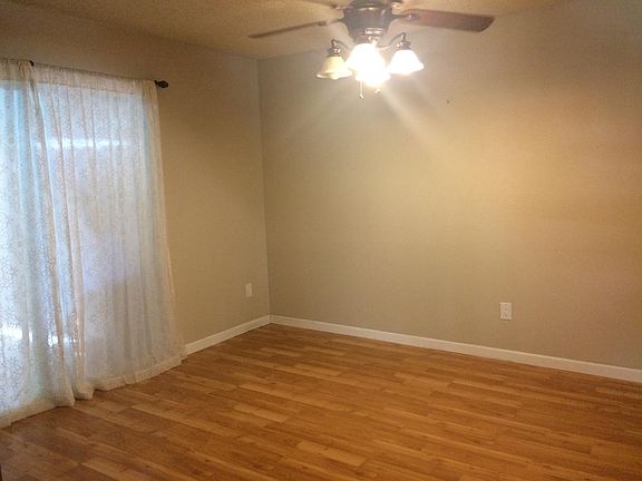 Dining area with new slider to patio and pass thru window fr