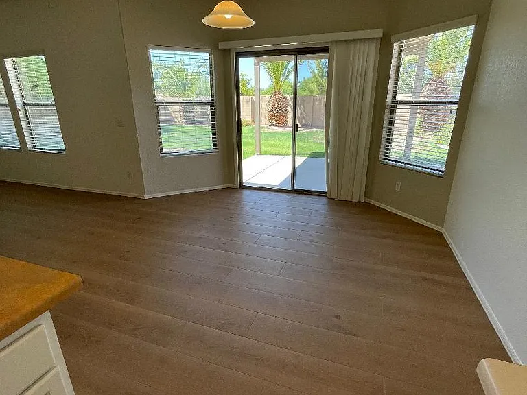 Breakfast Room with a view of the backyard and covered patio