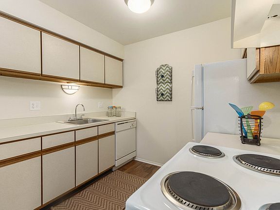 Spacious kitchen with various cabinets at Eastwood Village Apartments in Clinton Township, MI