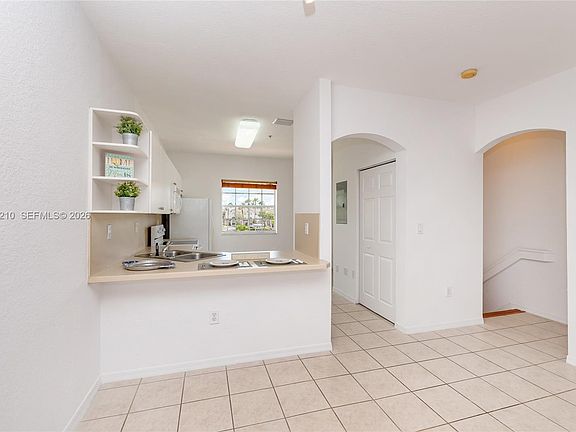 4th image of 5610 NW 114th Pl APT 218