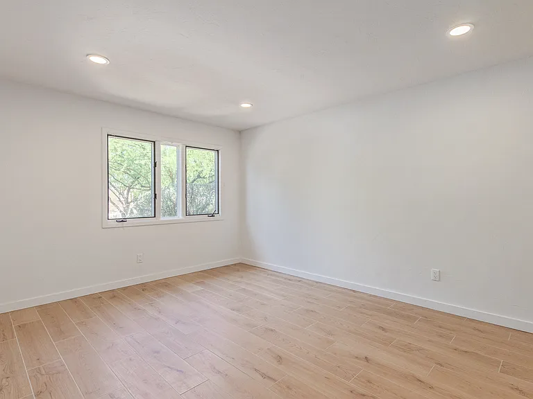 SO MANY POSSIBILITES WITH THIS BEDROOM! SPACIOUS, TWO CLOSETS, & AN ENSUITE! COULD DOBULE AS A SECOND PRIMARY