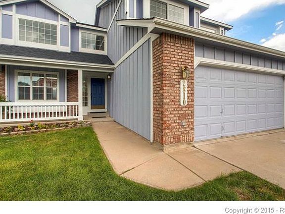 The two story entry and living room give a spacious, airy & open feel to the hom