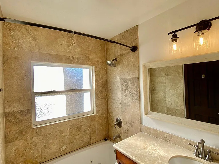 Rear shower / jacuzzi tub