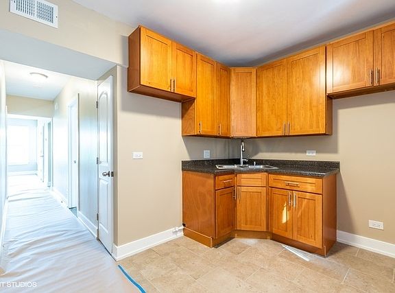 5th image of 7917 S Maryland Ave